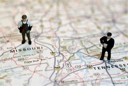 simsearch:625-00898537,k - Close-up of the figurines of two construction workers on a map Stock Photo - Premium Royalty-Free, Code: 625-00898568