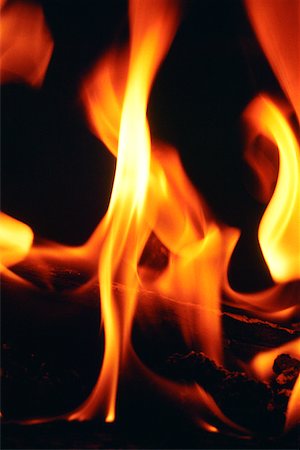 Close-up of a log fire Foto de stock - Sin royalties Premium, Código: 625-00898616