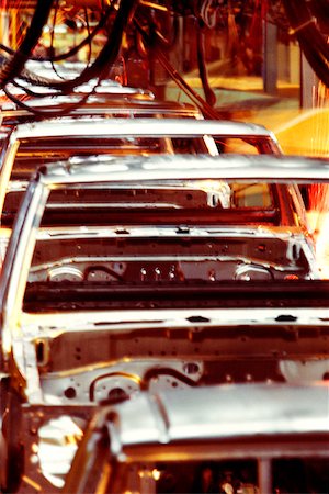 robotic hands - Row of cars in an assembly line, Smyrna, Tennessee, USA Stock Photo - Premium Royalty-Free, Code: 625-00898635