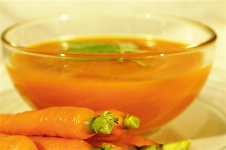 Close-up of a bowl of carrot soup Stock Photo - Premium Royalty-Free, Code: 625-00898850