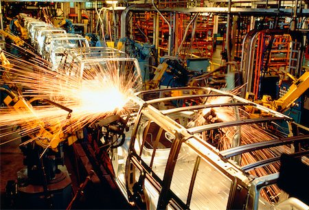 Robots welding automobile van bodies on an assembly line, Baltimore, Maryland, USA Foto de stock - Sin royalties Premium, Código: 625-00899017