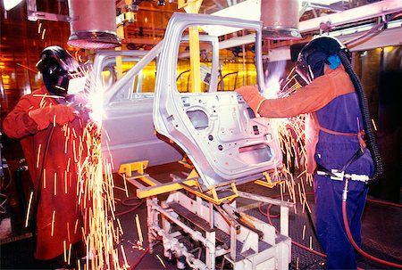 Welder working on car doors in an assembly line, Newark, Delaware, USA Stock Photo - Premium Royalty-Free, Code: 625-00899063