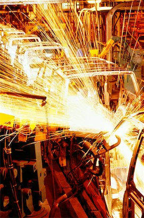 Robots welding automobile van bodies on an assembly line, Baltimore, Maryland, USA Foto de stock - Sin royalties Premium, Código: 625-00899090