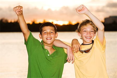 Two boys fishing in a lake - Stock Photo - Masterfile - Premium  Royalty-Free, Code: 625-00902178