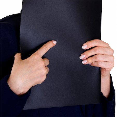 simsearch:625-01748576,k - Close-up of a businesswoman's hand holding a file over her face Foto de stock - Royalty Free Premium, Número: 625-00900628