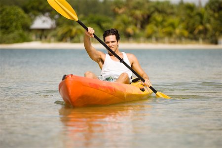 portrait and kayak - Portrait of a young man kayaking Stock Photo - Premium Royalty-Free, Code: 625-00900706