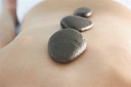 simsearch:625-00901115,k - Close-up of stones on a person's back Stock Photo - Premium Royalty-Free, Code: 625-00900711