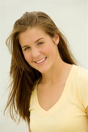 Portrait of a teenage girl smiling Stock Photo - Premium Royalty-Free, Code: 625-00900721