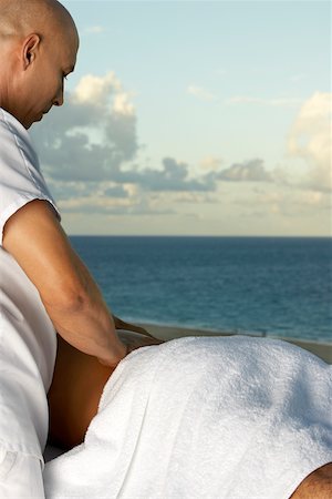 Close-up of a man getting a back massage Stock Photo - Premium Royalty-Free, Code: 625-00900929