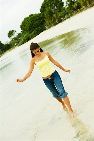 simsearch:625-00902214,k - Girl wading in water on the beach Stock Photo - Premium Royalty-Free, Code: 625-00900948