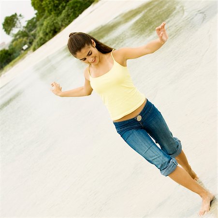 Girl walking on the beach Stock Photo - Premium Royalty-Free, Code: 625-00900969