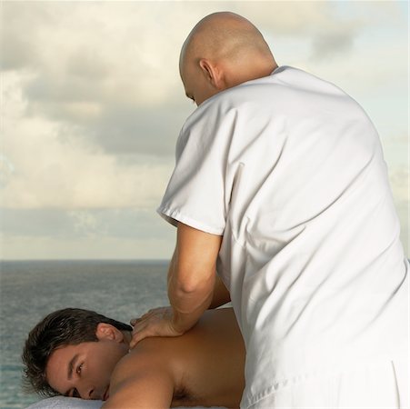 simsearch:625-00901115,k - Mid adult man getting a back massage Stock Photo - Premium Royalty-Free, Code: 625-00901076