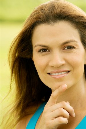 simsearch:625-01747375,k - Portrait of a mid adult woman smiling Stock Photo - Premium Royalty-Free, Code: 625-00901317