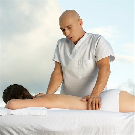 simsearch:625-00901115,k - Young woman getting a back massage Stock Photo - Premium Royalty-Free, Code: 625-00901404