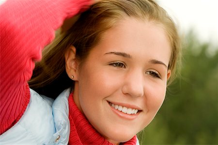 simsearch:625-00901126,k - Close-up of a teenage girl smiling Foto de stock - Sin royalties Premium, Código: 625-00901635