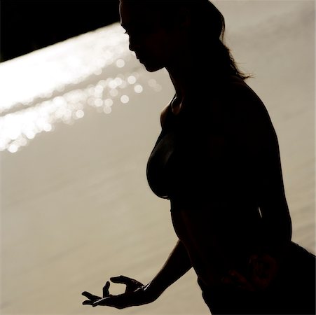 silhouette female martial arts - Silhouette of a young woman practicing martial arts Stock Photo - Premium Royalty-Free, Code: 625-00901993