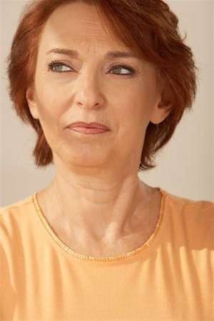 Close-up of a senior woman thinking Stock Photo - Premium Royalty-Free, Code: 625-00902208