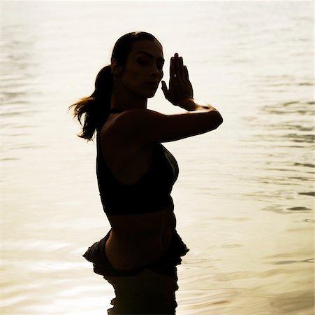 simsearch:625-00839293,k - High angle view of a young woman exercising in a lake Stock Photo - Premium Royalty-Free, Code: 625-00902295