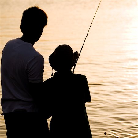 simsearch:625-00840696,k - Silhouette d'un père et son fils de pêche Photographie de stock - Premium Libres de Droits, Code: 625-00902387