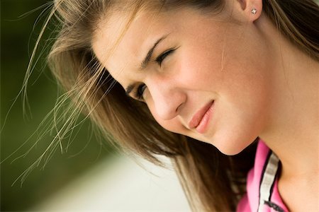Close-up of a teenage girl thinking Stock Photo - Premium Royalty-Free, Code: 625-00902465