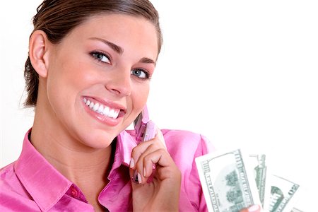 Close-up of a young woman smiling Stock Photo - Premium Royalty-Free, Code: 625-00902602