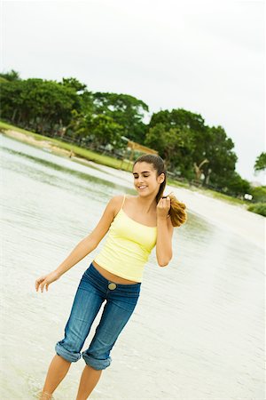 simsearch:625-00902214,k - Girl standing on the beach Stock Photo - Premium Royalty-Free, Code: 625-00902821