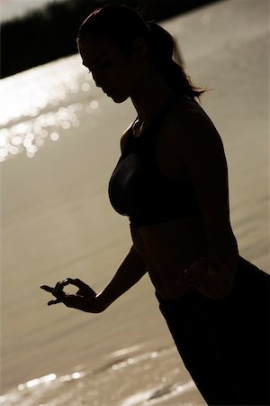 silhouette female martial arts - Silhouette of a young woman practicing martial arts Stock Photo - Premium Royalty-Free, Code: 625-00902995