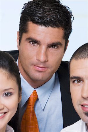 simsearch:625-02931286,k - Portrait of two businessmen and a businesswoman Stock Photo - Premium Royalty-Free, Code: 625-00903065