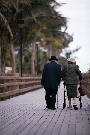 Senior couple walking on a walkway, Miami, Florida, USA Foto de stock - Sin royalties Premium, Código: 625-00903234