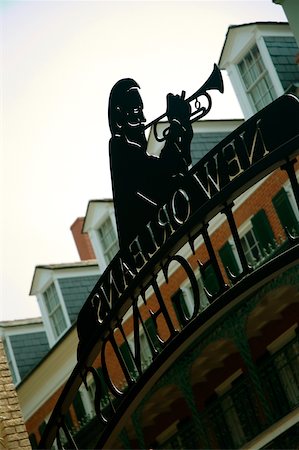 Low angle view of the statue of a man playing the trumpet, New Orleans, Louisiana, USA Foto de stock - Sin royalties Premium, Código: 625-00903551