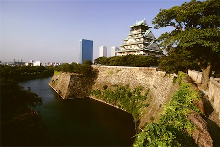 Castle along a moat, Osaka Castle Osaka, Japan Stock Photo - Premium Royalty-Free, Code: 625-00903696