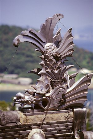 Close-up of a metal dragon sculpture, Roof Guardian, Okasaki Castle, Tokushima, Shikoku, Japan Stock Photo - Premium Royalty-Free, Code: 625-00903773