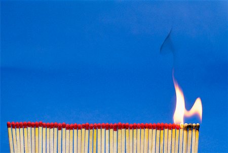 Close-up of matchsticks burning Stock Photo - Premium Royalty-Free, Code: 625-00903816