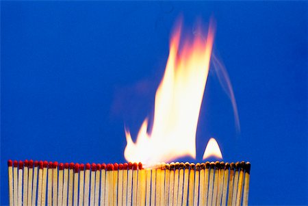 Close-up of matchsticks burning Stock Photo - Premium Royalty-Free, Code: 625-00903817