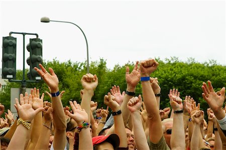 Large group of people waving their arms at a gay parade Stock Photo - Premium Royalty-Free, Code: 625-01038094