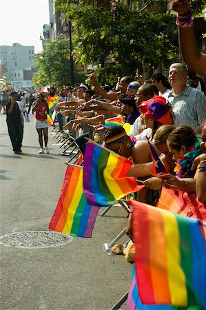 rainbow, road - Large group of people waving gay right flags at a gay parade Stock Photo - Premium Royalty-Free, Code: 625-01038230