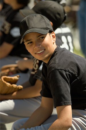 simsearch:640-02764424,k - Side profile of a baseball player smiling Stock Photo - Premium Royalty-Free, Code: 625-01038337