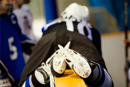 simsearch:625-01038051,k - Rear view of an ice hockey player lying on a railing Stock Photo - Premium Royalty-Free, Code: 625-01038426