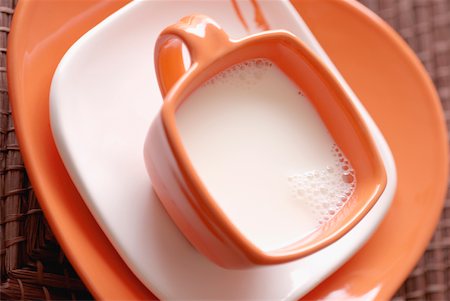 High angle view of a cup of milk Stock Photo - Premium Royalty-Free, Code: 625-01038588