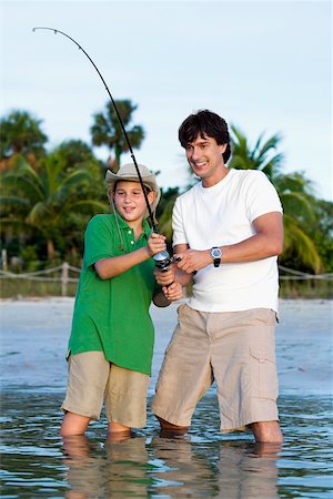 simsearch:625-01098257,k - Father and his son fishing Foto de stock - Sin royalties Premium, Código: 625-01039485