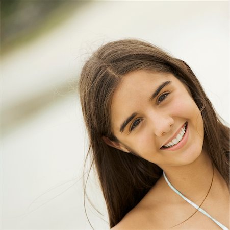 Portrait of a girl smiling Stock Photo - Premium Royalty-Free, Code: 625-01039526