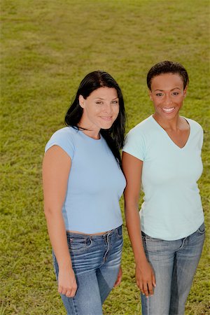 simsearch:625-01097322,k - Portrait of two young women smiling Stock Photo - Premium Royalty-Free, Code: 625-01039554