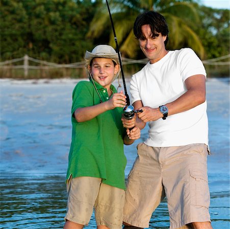 simsearch:625-01098257,k - Father and his son fishing Foto de stock - Sin royalties Premium, Código: 625-01039556