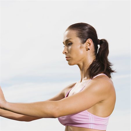 simsearch:625-00901737,k - Side profile of a mid adult woman exercising Stock Photo - Premium Royalty-Free, Code: 625-01039592