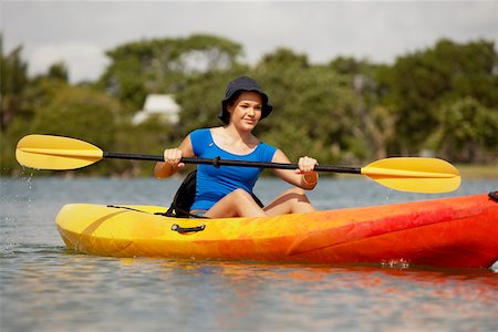 Teenage girl kayaking Stock Photo - Premium Royalty-Free, Code: 625-01039730