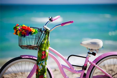 Close-up of a bicycle on the beach Stock Photo - Premium Royalty-Free, Code: 625-01039803