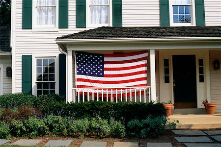 digno - An American flag is displayed on a porch, Bermuda Foto de stock - Sin royalties Premium, Código: 625-01040453