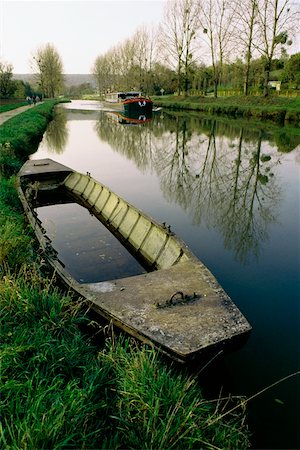 simsearch:625-01041167,k - High angle of an old boat with a barge moving upstream, Burgundy Canal, France Stock Photo - Premium Royalty-Free, Code: 625-01040661