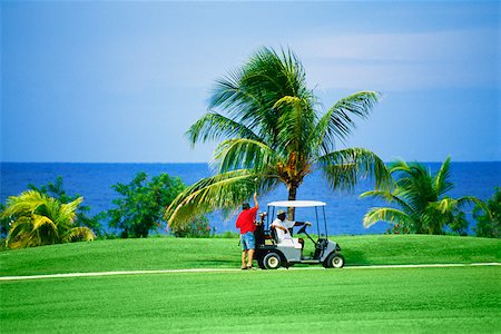people in jamaica - A golf cart is seen on a golfcourse at Wyndham Resort, Jamaica Stock Photo - Premium Royalty-Free, Code: 625-01040844