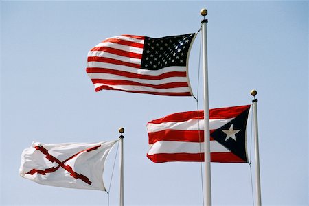 puerto rico flag not vector - Front view of three fluttering flags, El Morro Fort, San Juan, Puerto Rico Stock Photo - Premium Royalty-Free, Code: 625-01040962
